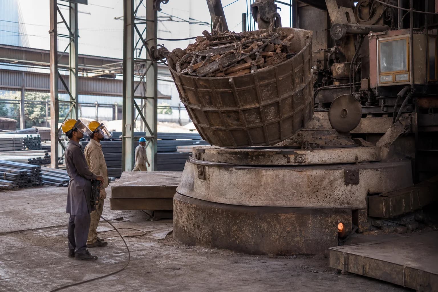 Prepared ferrous scrap feeding a conventional steel furnace for long-product production