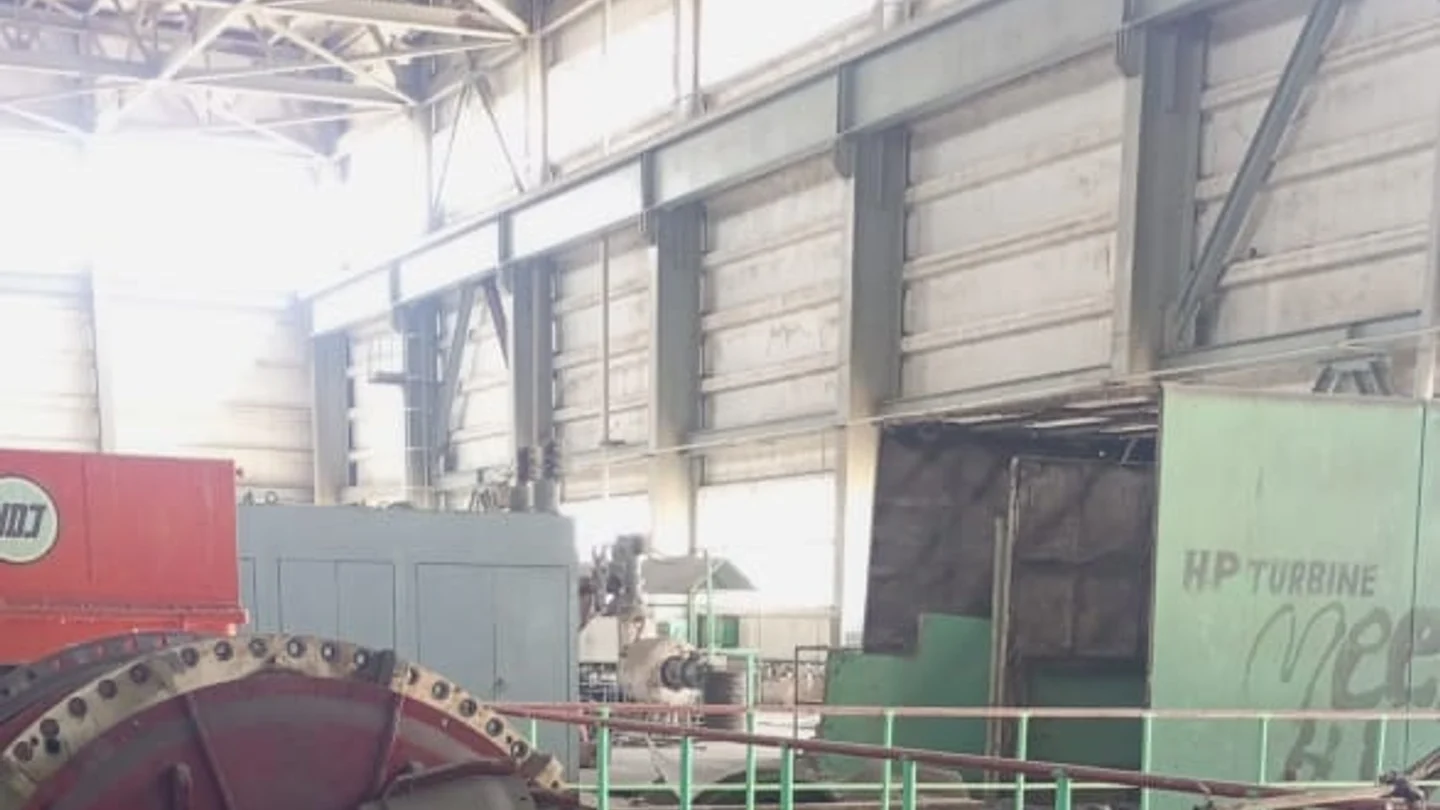Generator number 3 in the HP turbine hall with cooler banks laid out on the floor alongside