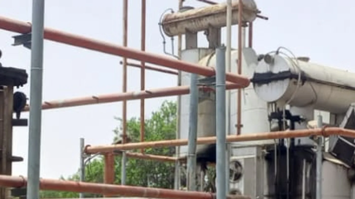 220 MW transformer with HV bushings and radiator banks intact on its rail plinth